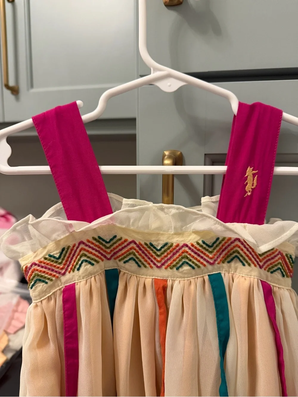 Well Dressed Wolf Cream Chiffon Dress with Pink Straps and Teal & Orange Ribbons